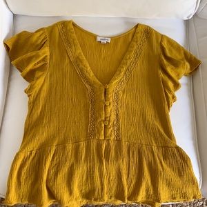 Yellow “eyeshadow” shirt